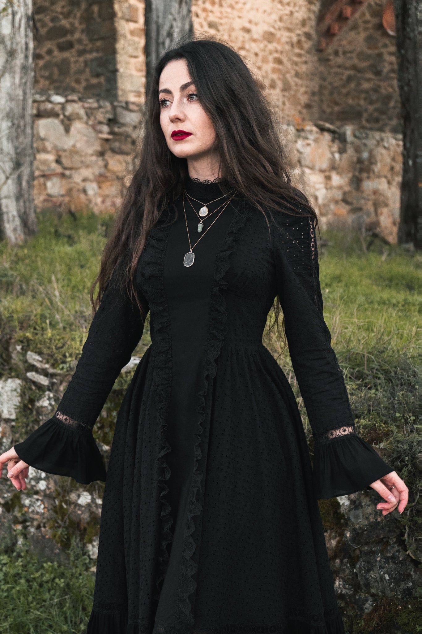 Witch vibe girl in black maxi boho dress 