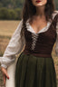 Close-up of the Estella dark brown linen corset top with adjustable front lacing over a white blouse