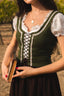 Close-up of the Estella moss green linen corset showing the floral ribbon trim, neckline and front lacing