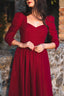 Close-up of the Siena burgundy linen dress showing the sweetheart neckline and sleeve details