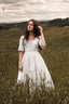 under-the-tuscan-sky-ivory-wedding-dress-back-view
Back view of the Under the Tuscan Sky ivory linen wedding dress photographed among olive trees