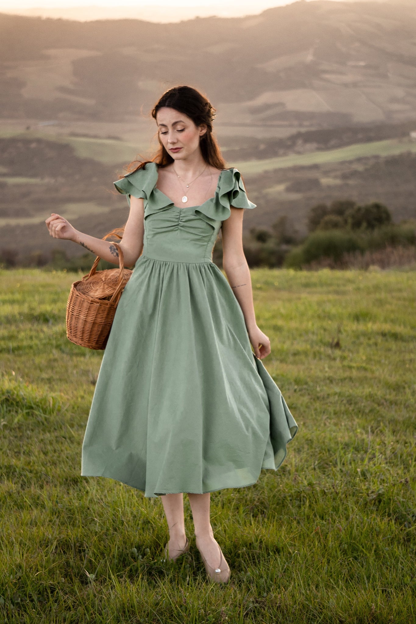 Midi-length sage green cotton dress with butterfly sleeves